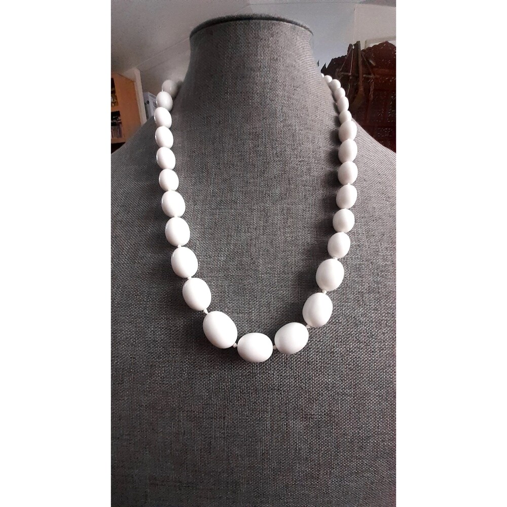 Trifari white lucite oval bead single strand necklace. Individually knotted
